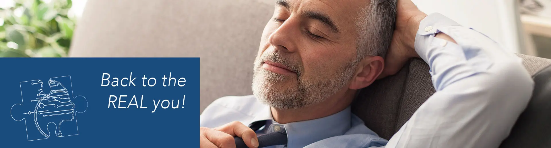 MATURE MAN RELAXING WITH EYES CLOSED